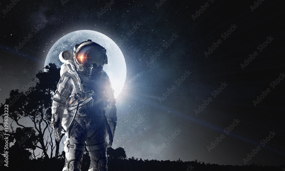Fototapeta premium Spaceman in astronaut suit. Mixed media