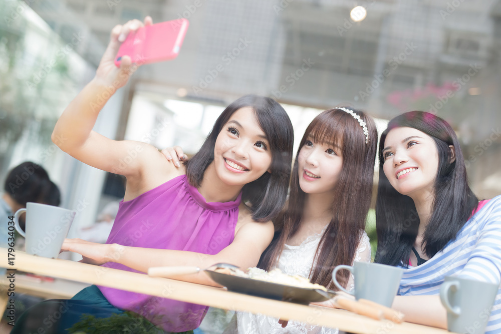 happy woman friends in restaurant happy woman friends in restaurant