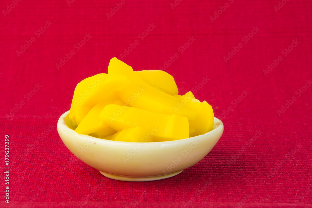 preserved mango fruits Snack on a Background preserved mango fruits Snack on a Background