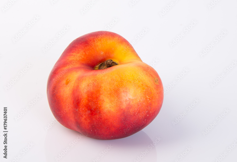 flat peaches (donut peaches) on a background flat peaches (donut peaches) on a background