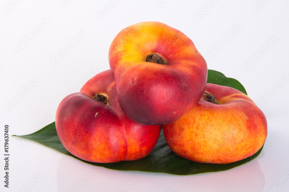 flat peaches (donut peaches) on a background flat peaches (donut peaches) on a background