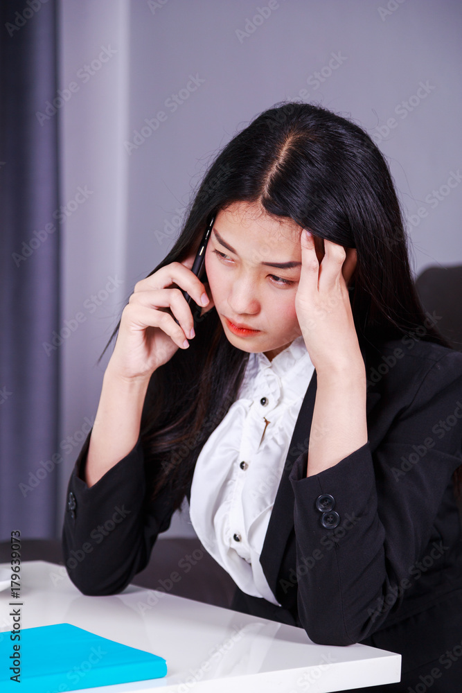woman in business suit working in stress desperate talking on mobile phone woman in business suit working in stress desperate talking on mobile phone