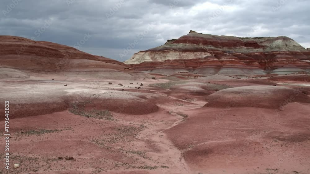 Flying low over colorful hills in the Mars like landscape of the Utah desert. Flying low over colorful hills in the Mars like landscape of the Utah desert.