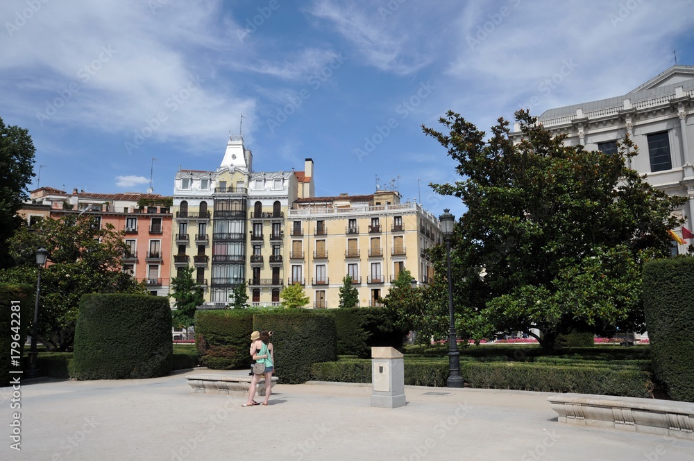 Plaza de Oriente Central Gardens with Monument to Philip IV located between the Royal Palace and the Royal Theatre in Madrid.