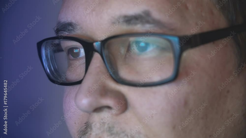Young Businessman Glasses Computer Screen Late Night Work Reflection Browsing Online Internet Connection Remote Work Office Stay Up Crime Investigation Uhd 4K. Young Businessman Glasses Computer Screen Late Night Work Reflection Browsing Online Internet Connection Remote Work Office Stay Up Crime Investigation Uhd 4K.