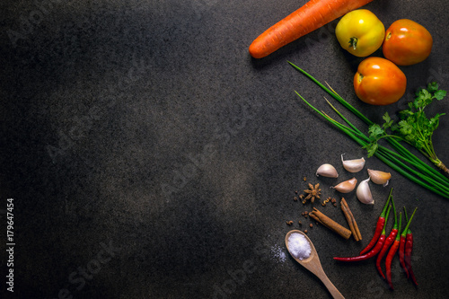 Fresh Vegetables for Healthy Diet on a rustic table. Top view, copy space, dark background