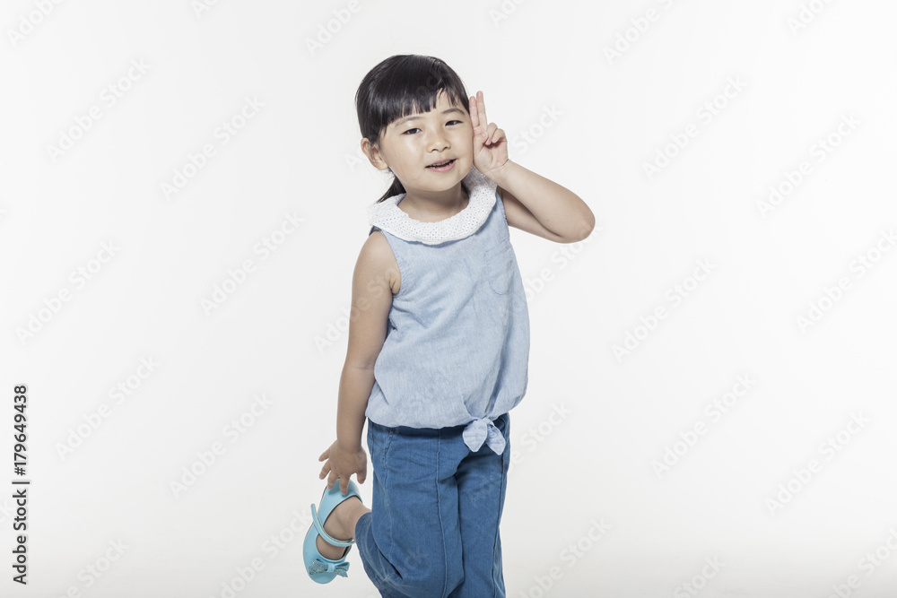 pretty asian girl dancing with smile isolated white. pretty asian girl dancing with smile isolated white.