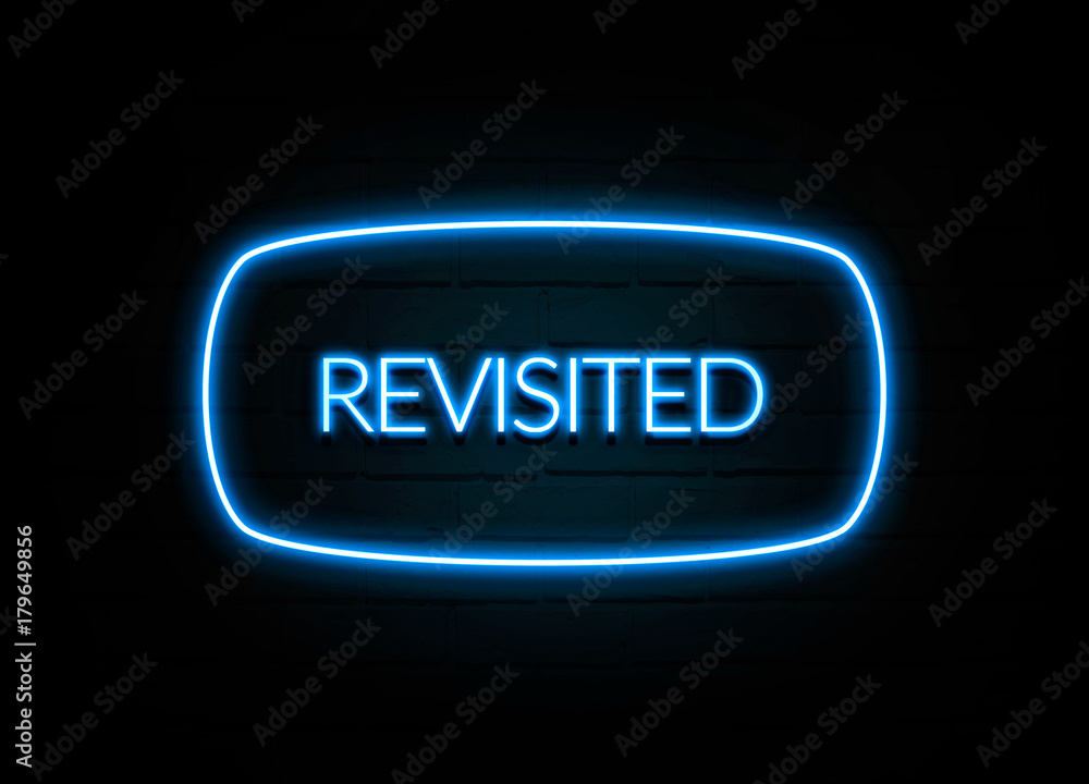 Revisited - colorful Neon Sign on brickwall Revisited - colorful Neon Sign on brickwall