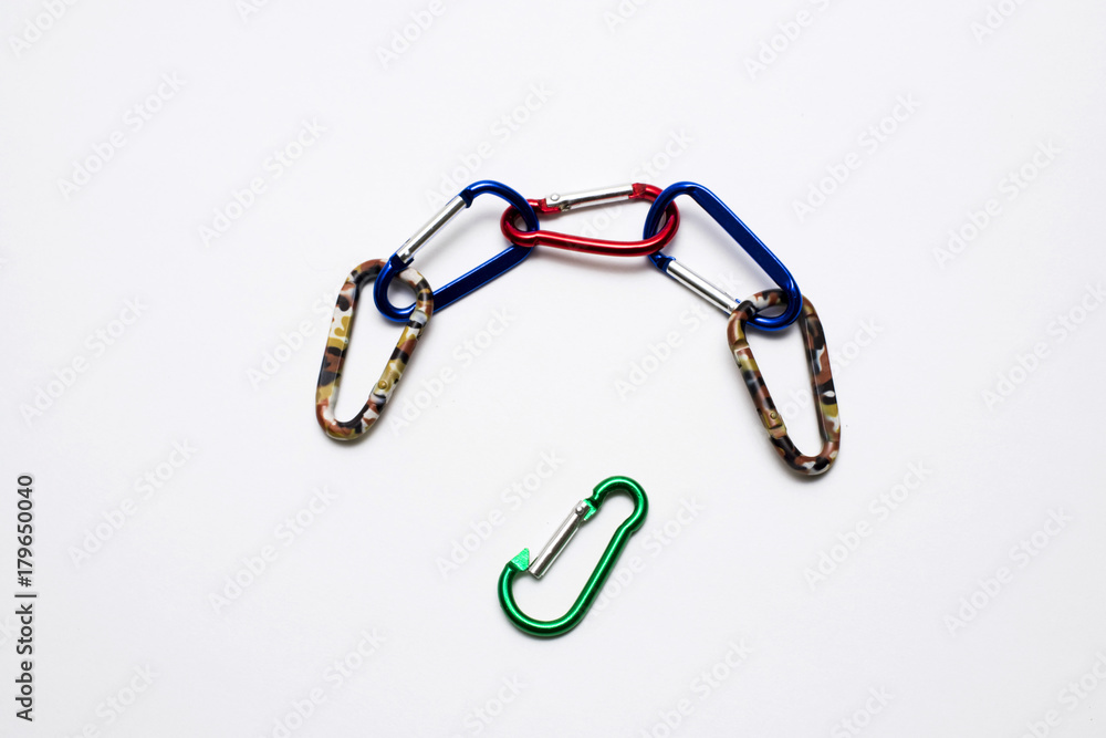Carabiners of different colors on white background Carabiners of different colors on white background
