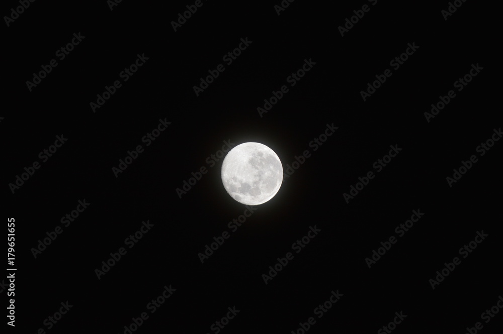 Bright moon in a black sky Bright moon in a black sky