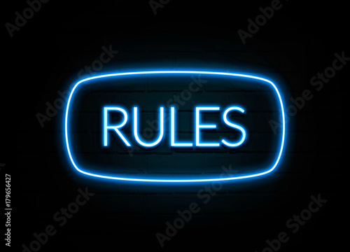 Rules  - colorful Neon Sign on brickwall