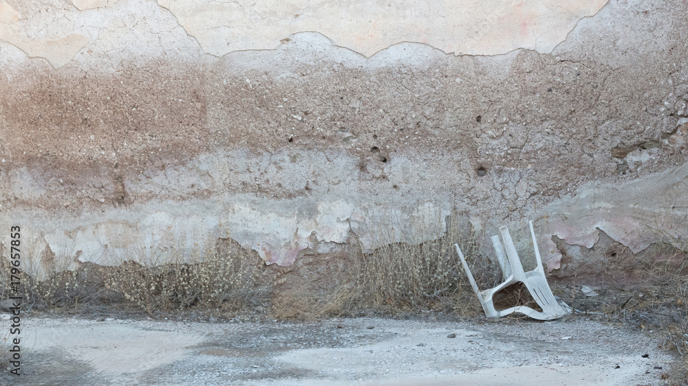 Abandoned house in Greece - Abandoned plastic chair Abandoned house in Greece - Abandoned plastic chair