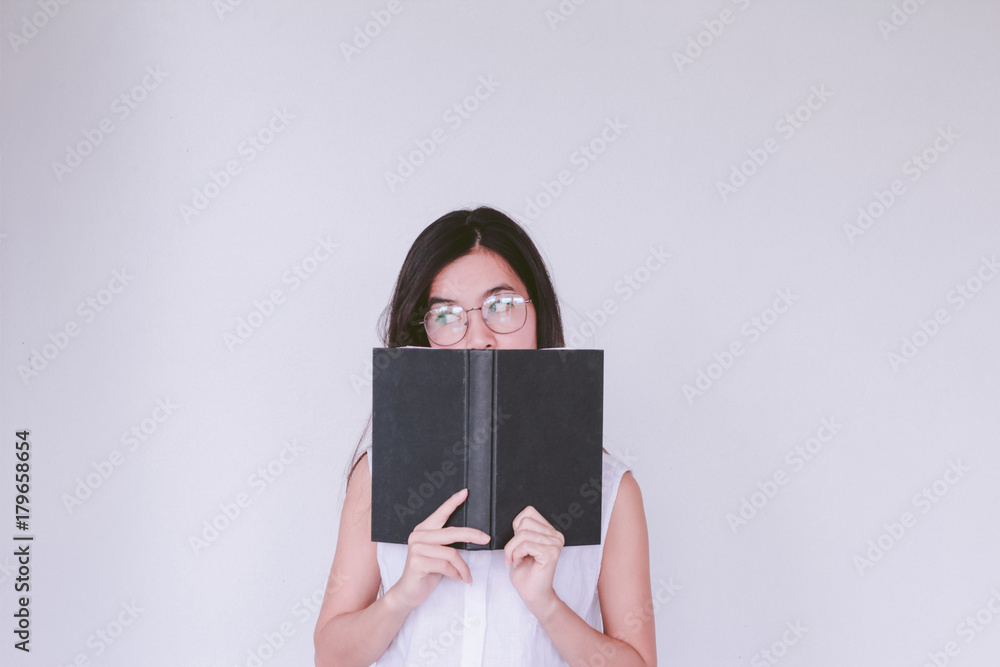 Young asian Student woman holding book with copy space Young asian Student woman holding book with copy space