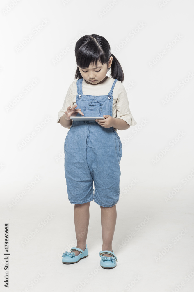 pretty asian girl hand holding a digital device(smart phone), stand up isolated white pretty asian girl hand holding a digital device(smart phone), stand up isolated white