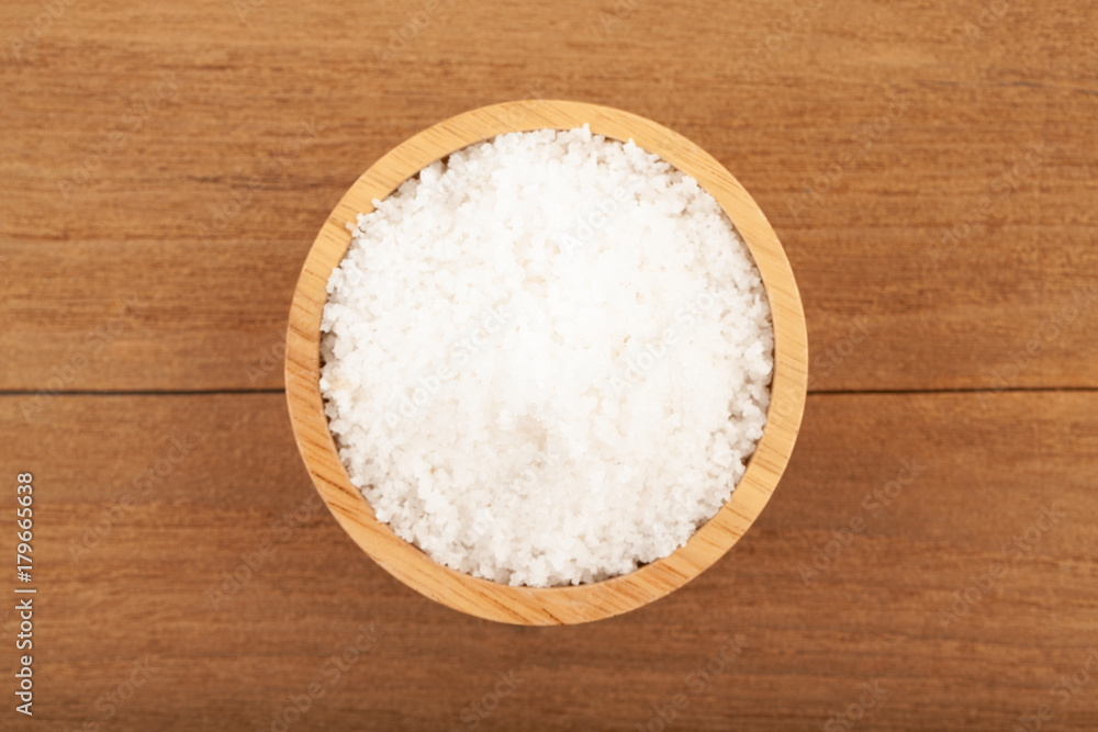 Sea salt in wooden bowl Sea salt in wooden bowl