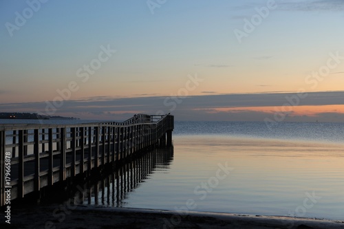 picturesque landing stage by the sea © Lars Gieger
