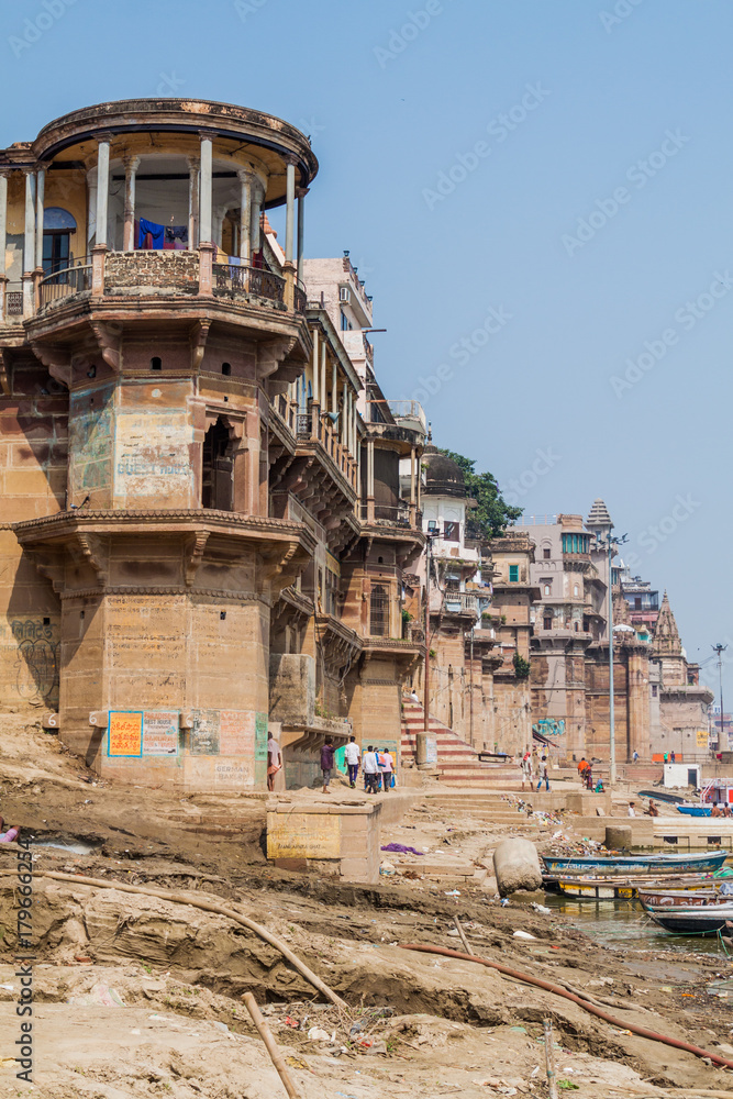 VARANASI, INDIA - OCTOBER 25, 2016: View of Ghats (riverfront steps) leading to the banks of the River Ganges in Varanasi, India