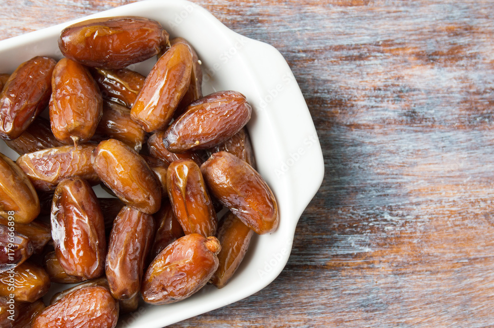 Dried date fruits on a plate Dried date fruits on a plate