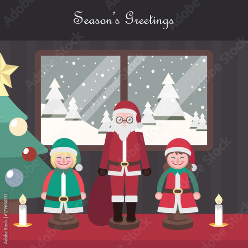 Peaceful Christmas indoor scene with Santa and elf figurines