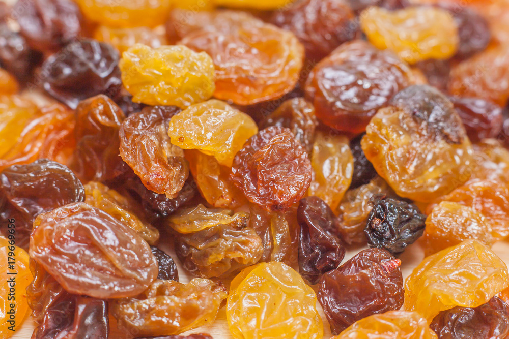 Dried raisins background close up Dried raisins background close up