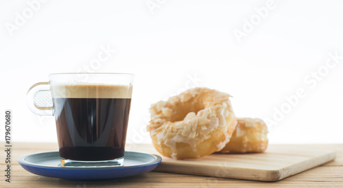 Fototapeta Naklejka Na Ścianę i Meble -  Cup of espresso and doughnut bakery.