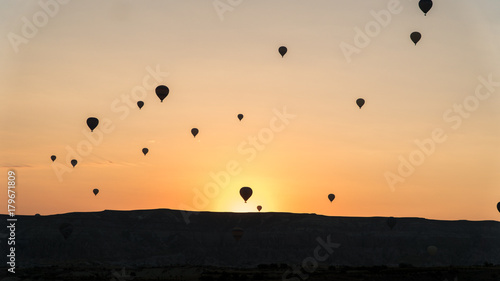 silhouettes of hot air balloons in Cappadocia, Turkey