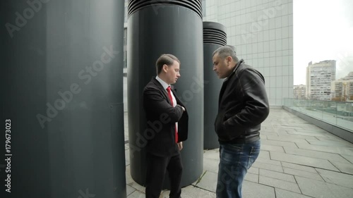 Man extorts money and threatens a victim with a gun.