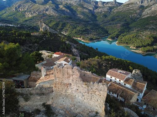 Ancient fortress San Jose castle in Guadalest, Spain. Drone photo photo