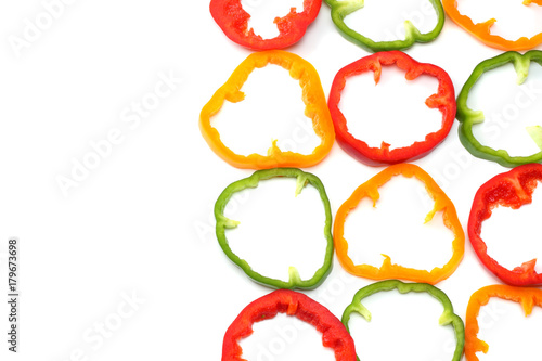sliced sweet bell pepper isolated on white background. top view