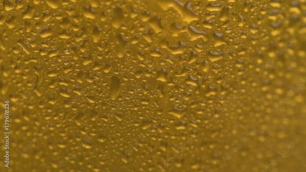 Energy Drink in a glass (macro shot with bubbles) in 4K UHD footage Energy Drink in a glass (macro shot with bubbles) in 4K UHD footage