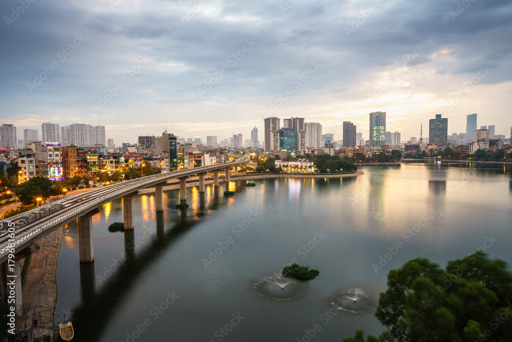Fototapeta premium Aerial skyline view of Hanoi. Hanoi cityscape at twilight at Hoang Cau lake