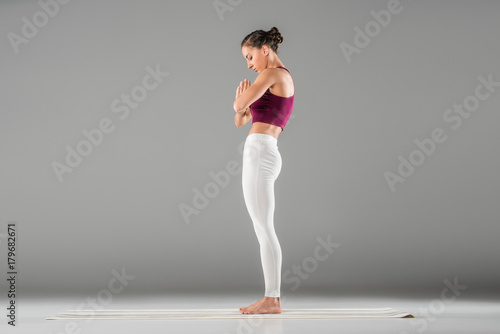 woman standing in yoga pose