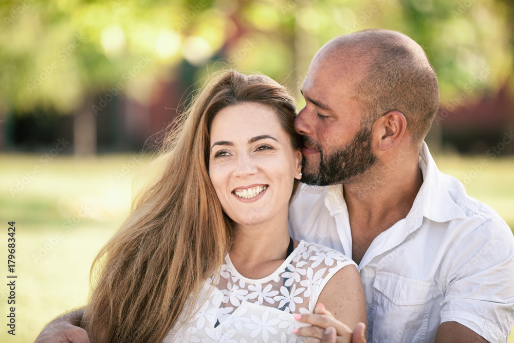 Happy Couple is Embracing Outdoors in Summer Happy Couple is Embracing Outdoors in Summer
