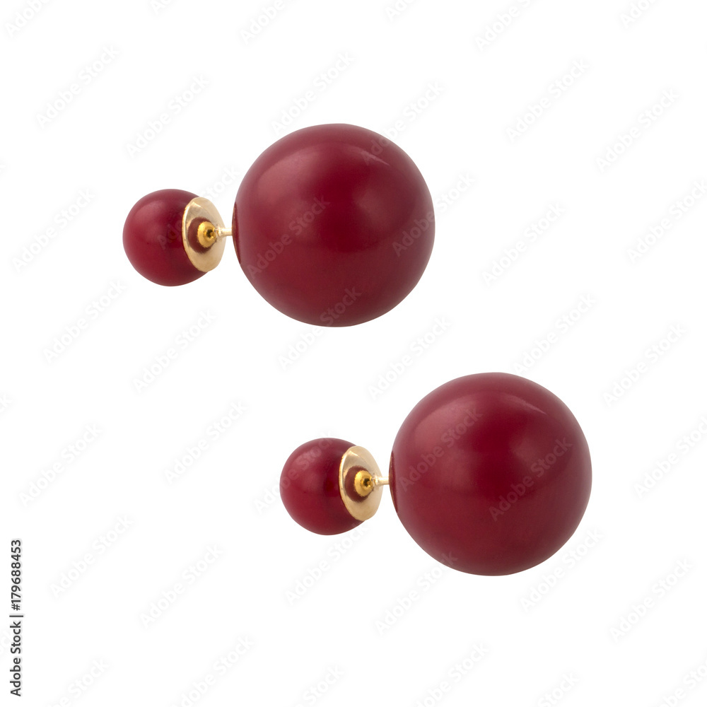 Golden earrings with gemstone isolated on white background Golden earrings with gemstone isolated on white background