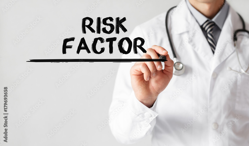 Doctor writing word Risk Factor with marker, Medical concept Doctor writing word Risk Factor with marker, Medical concept