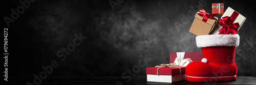 Wallpaper Mural Santa's shoe on dark background Torontodigital.ca