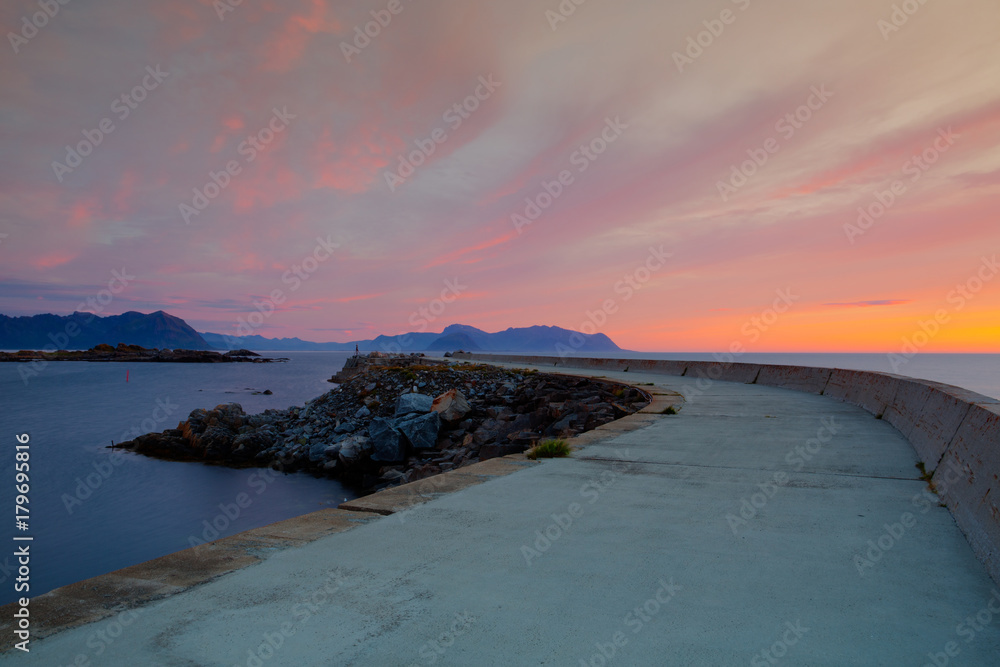 On the pier in Laukvik at sunset,Norway