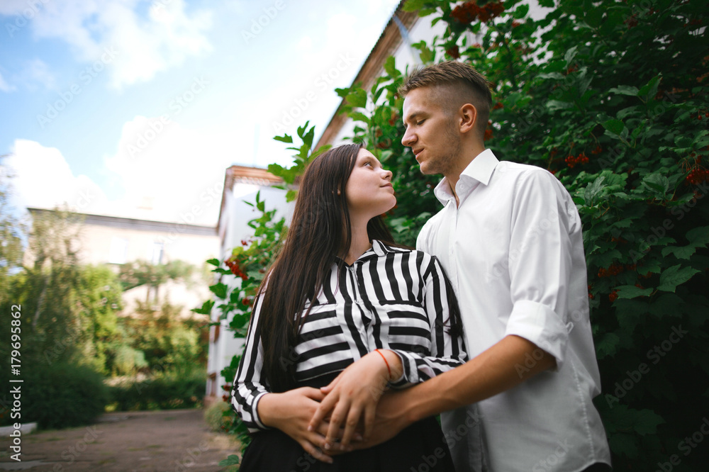 Fototapeta premium Loving Young Couple. The Guy and the Girl Love Each Other
