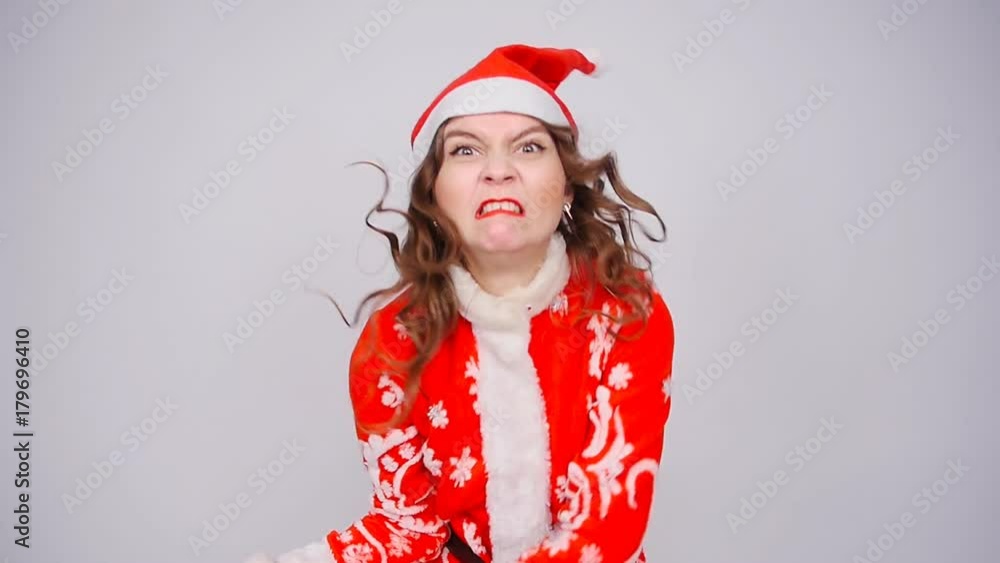 Angry Miss Santa with a bag of gifts Angry Miss Santa with a bag of gifts
