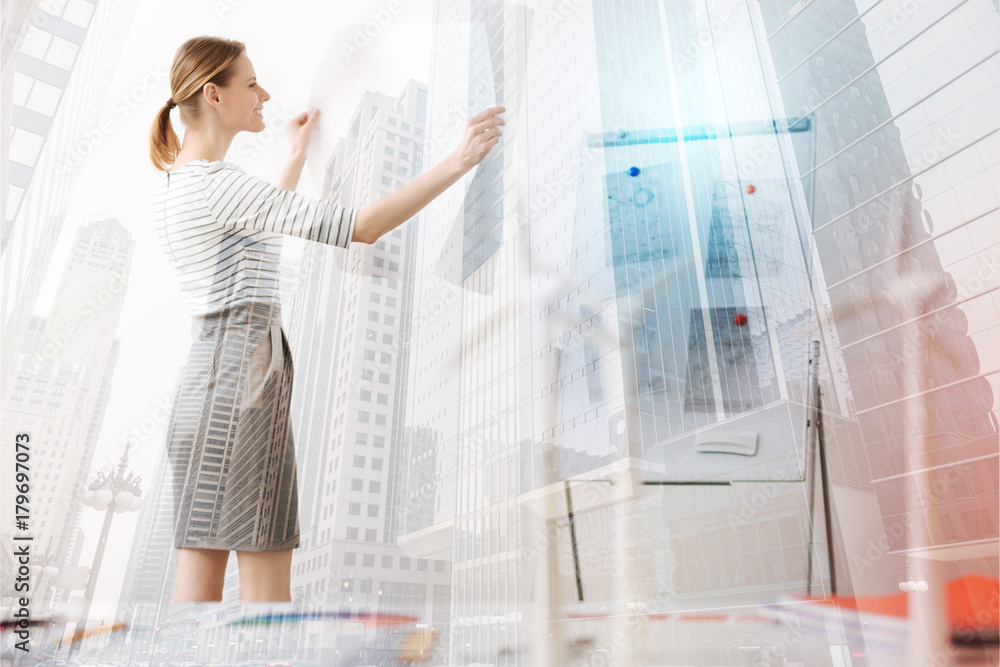Professional female engineer working on the blueprint Professional female engineer working on the blueprint