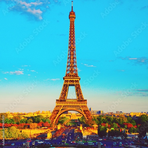 view of the Eiffel tower on a bright sunny day. Famous tourist place.