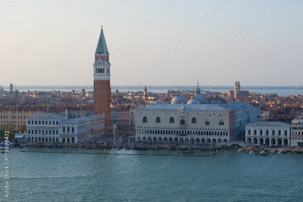 View of the Doge's Palace and the Campanile of St. Mark's Cathedral on a September evening. Venice, Italy