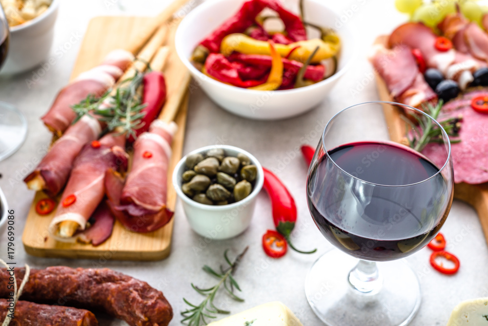 Traditional spanish tapas bar or wine snack set on table, food selection, appetizers of mediterranean diet