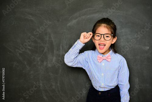 cheerful little girl dress up school teacher