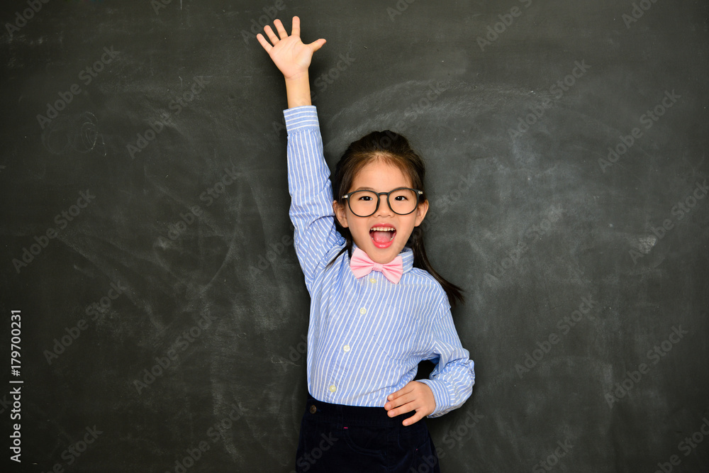 happy female children hand up to ask question happy female children hand up to ask question