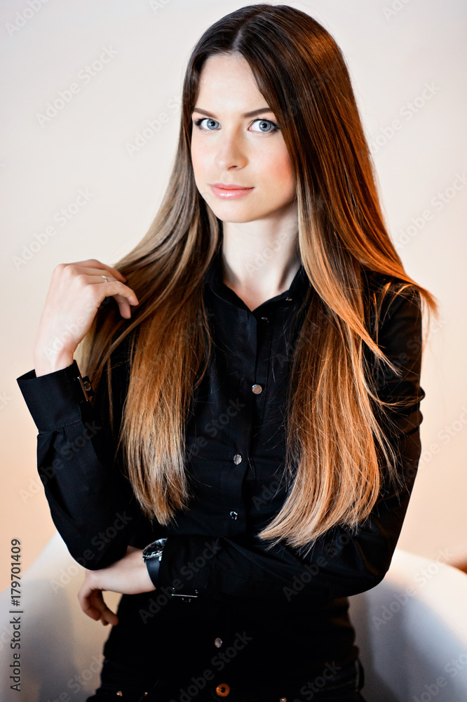 Fototapeta premium Portrait of sexy beautiful model girl with long gorgeous hair. Perfect skin and hair.