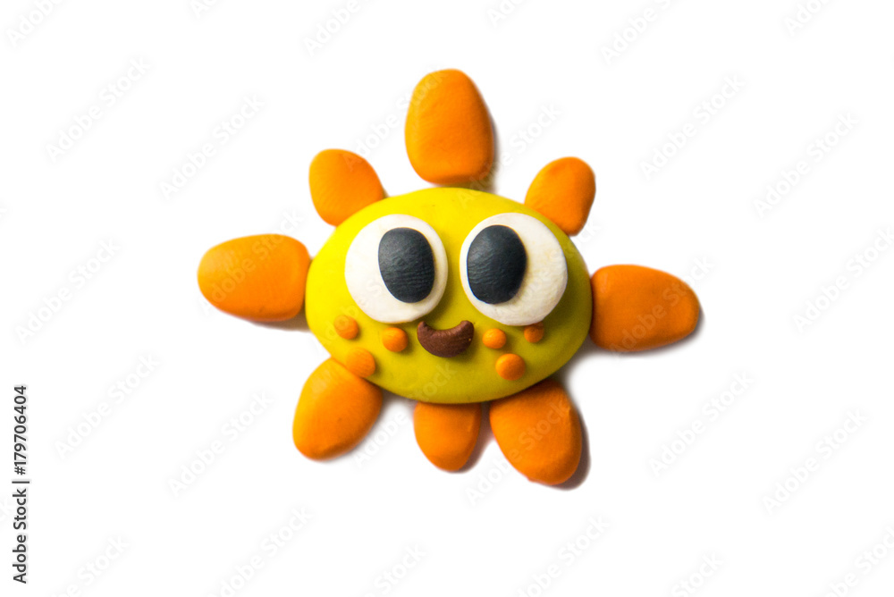 Fototapeta premium Modeling sun of plasticine. Photo illustration.