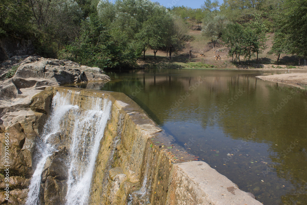 Fototapeta premium Perfect view waterfall in sunlight. Popular tourist attraction