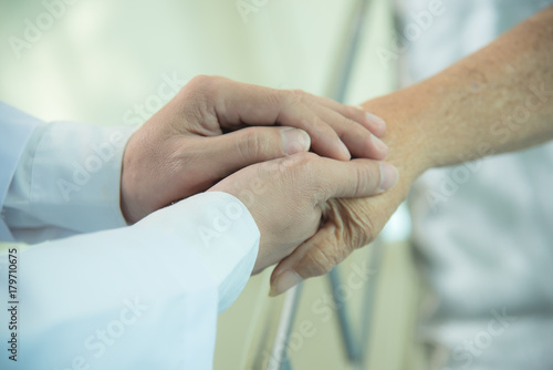 Doctor give moral to old patient