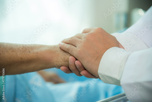 Doctor give moral to old patient
